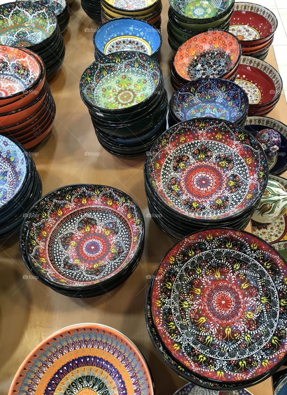Colorful hand painted pottery in a roadside shop in Jordan, halfway between Amman and Petra. 