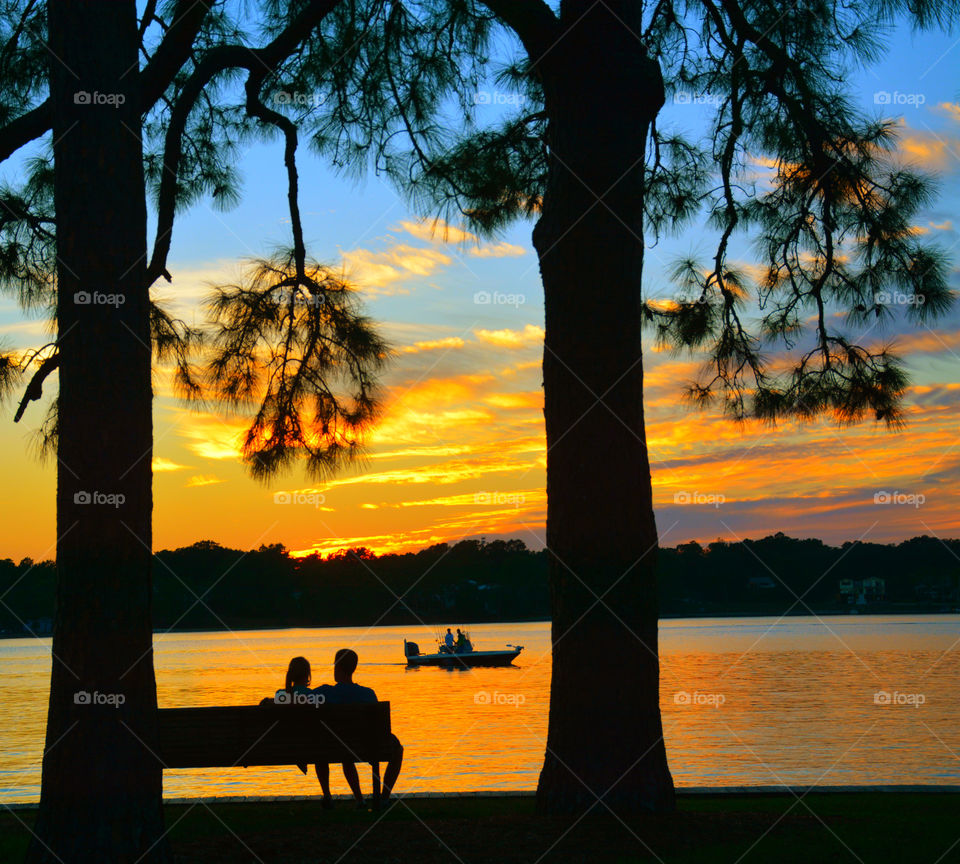 Amazing Silhouettes! Like the meeting of two worlds - the known and the unknown. The sun is like a great big romantic, inspirational fire in the sky. Brilliant streaks of yellow, orange, gold, blue, pink and red overcome the blue and purple of the sky. The sky resembled a prism; all the colors blended perfectly together. It's as if the colors and intensity of the light is just right! My work is done for today. I'm not sure what tomorrow will bring, but I'll be prepared for it!