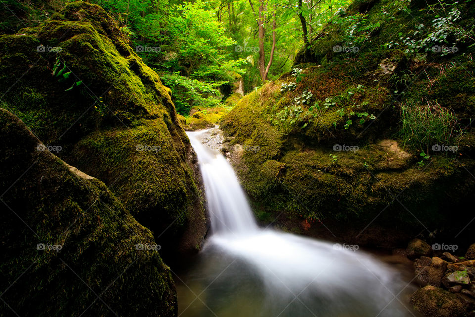 Small waterfall in deep Bulgarian forest 