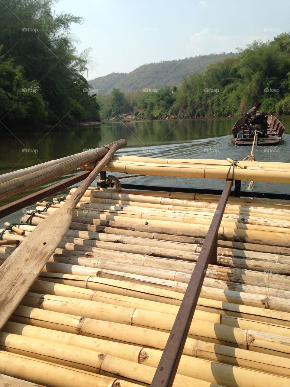 Bamboo boat in northern Thailand, Thai farmers ride across to get to work