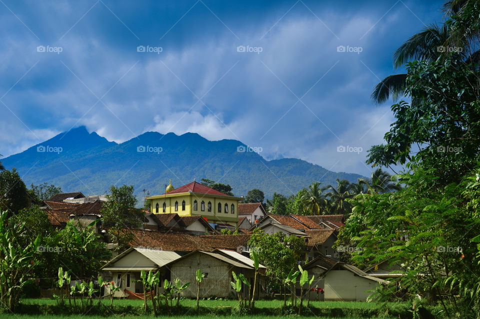 village with a view of Mount Galunggung in Singaparna district