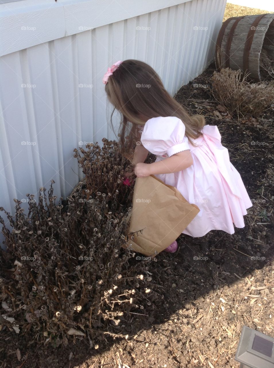 Easter Egg Hunt. My daughter, at my former MIL's house finding Easter eggs. 