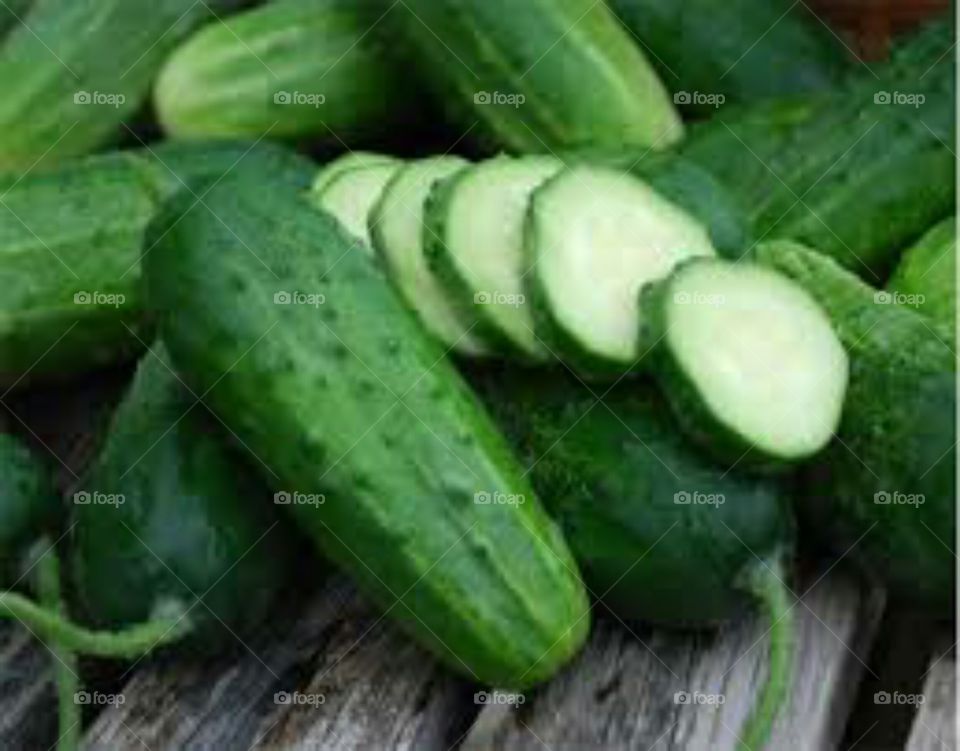 Cucumber is a widely cultivated plant in the gourd family, Cucurbitaceae. It is a creeping vine that bears cucumiform fruits that are used as vegetables. There are three main varieties of cucumber: slicing, pickling, and seedless.