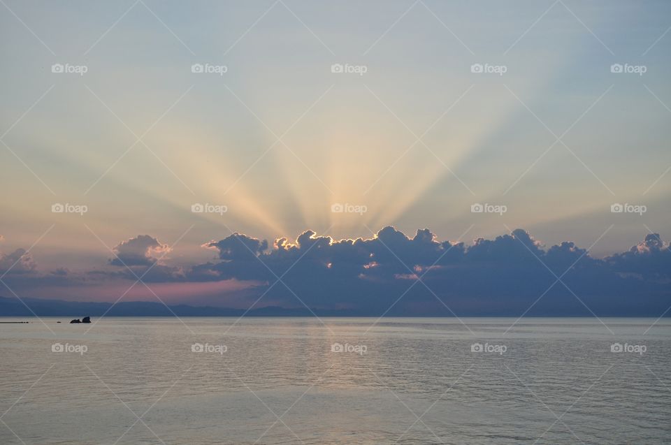 sunrays through the clouds over the black sea in Ukraine