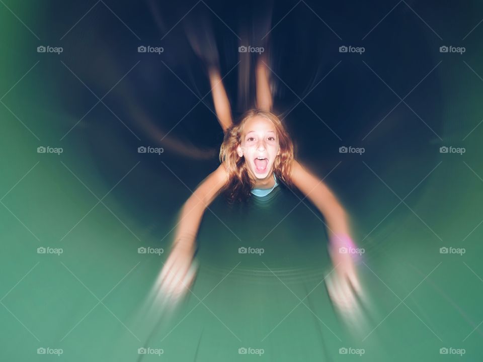 Girl riding in pool