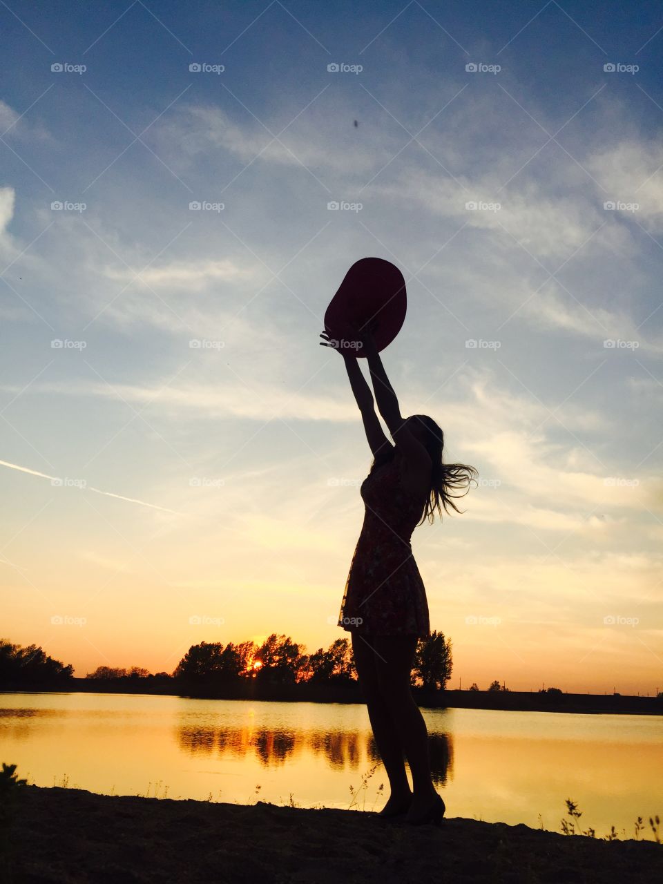 Silhouette of woman in the sunset