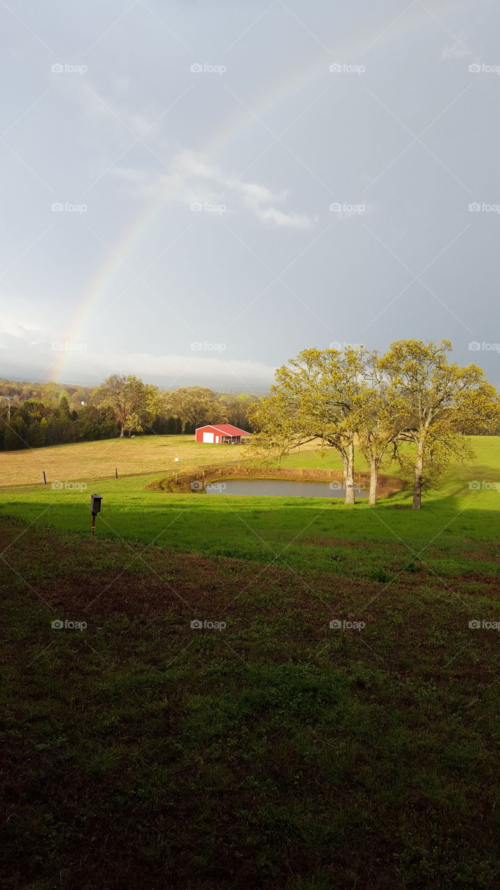 rainbow over the red barn