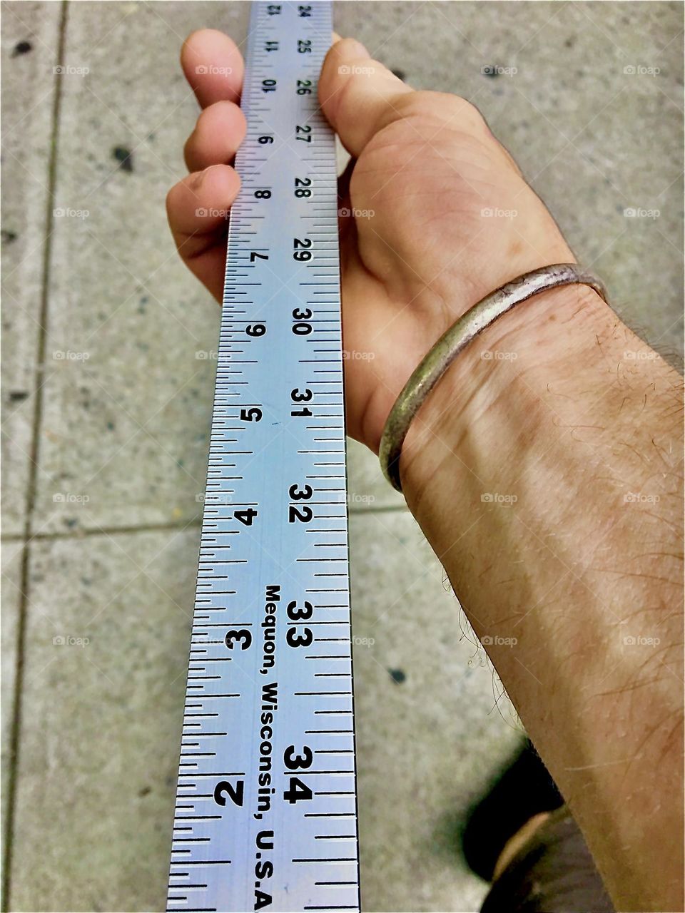 An aluminum ruler is a tool of the trade for every builder, craftsman or architect or simply for fixing things around the house, boat or a houseboat for that matter. Noone should ever be without it. 2021. Hypnotic Productions