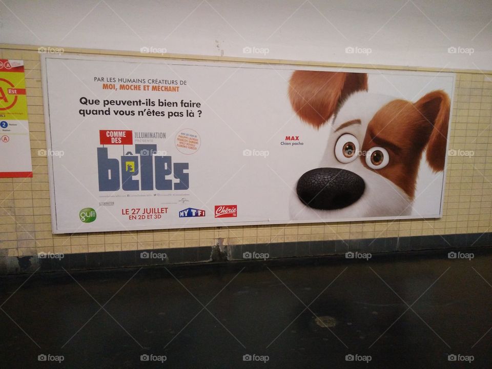 cartoon advertisement in subway station in Paris