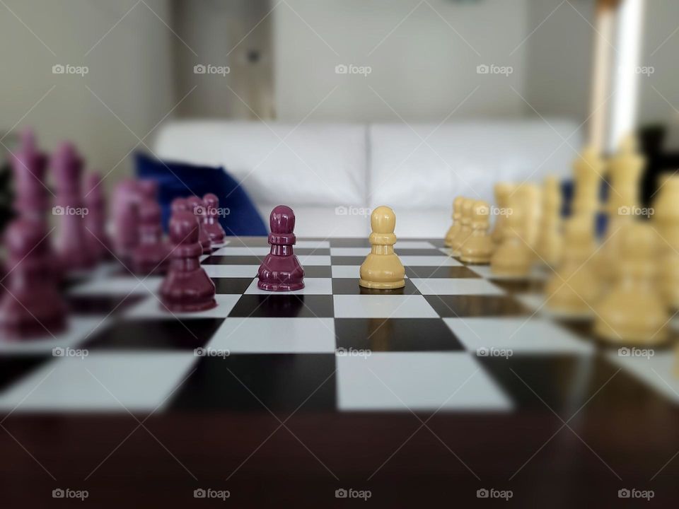 chess game on top of a wood table in the living room