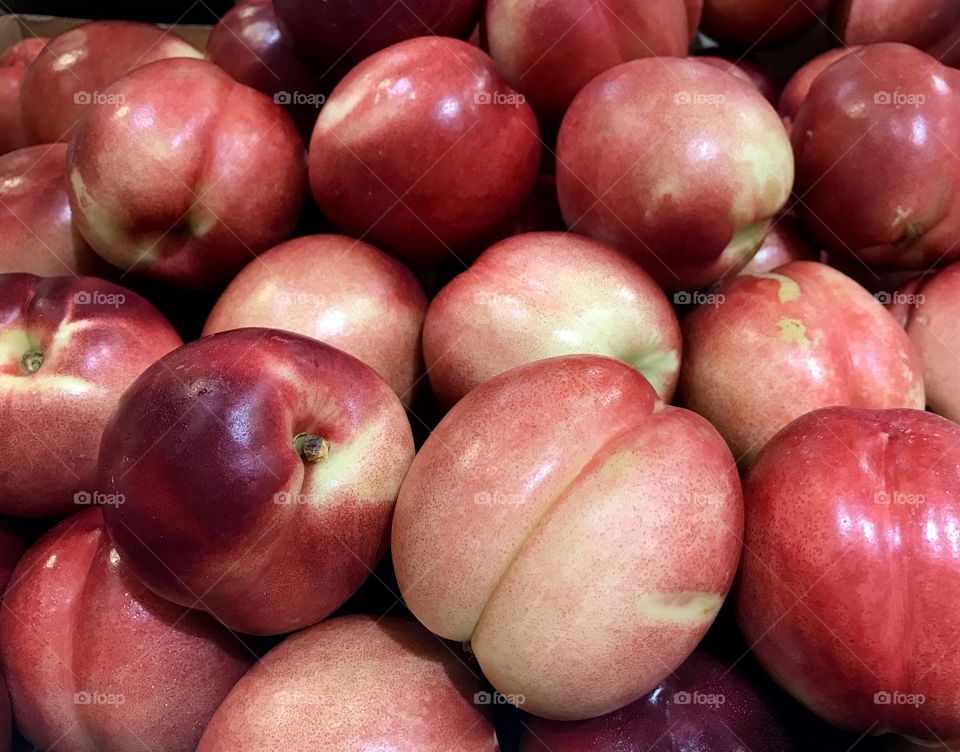 Fresh and young Nectarines in supermarket 