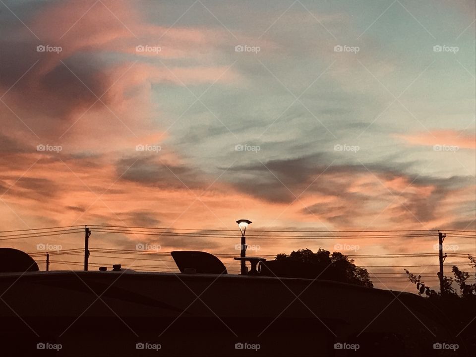 Beautiful Morning Sun Approach to full light of the day. Clouds taking many shapes and Colors receiving Sunrise. 