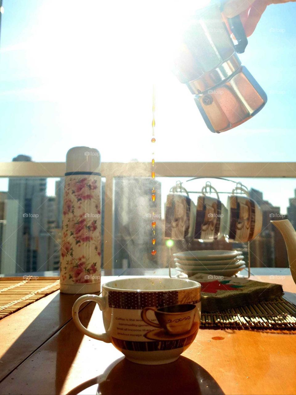 Coffee#energy#awakenings#cup#drink#beverage#served#sun#drops#city#view