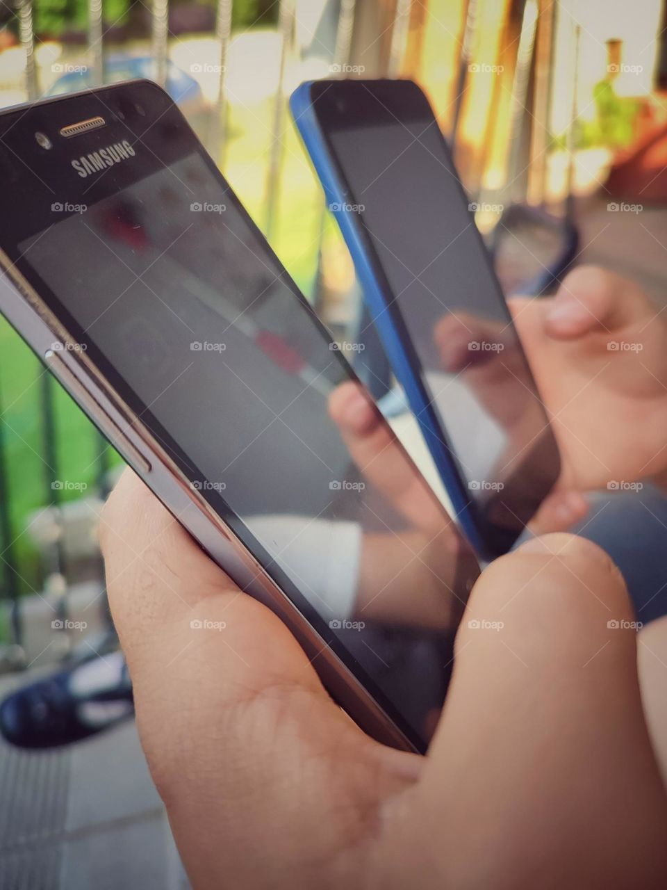 Children holding "phones"