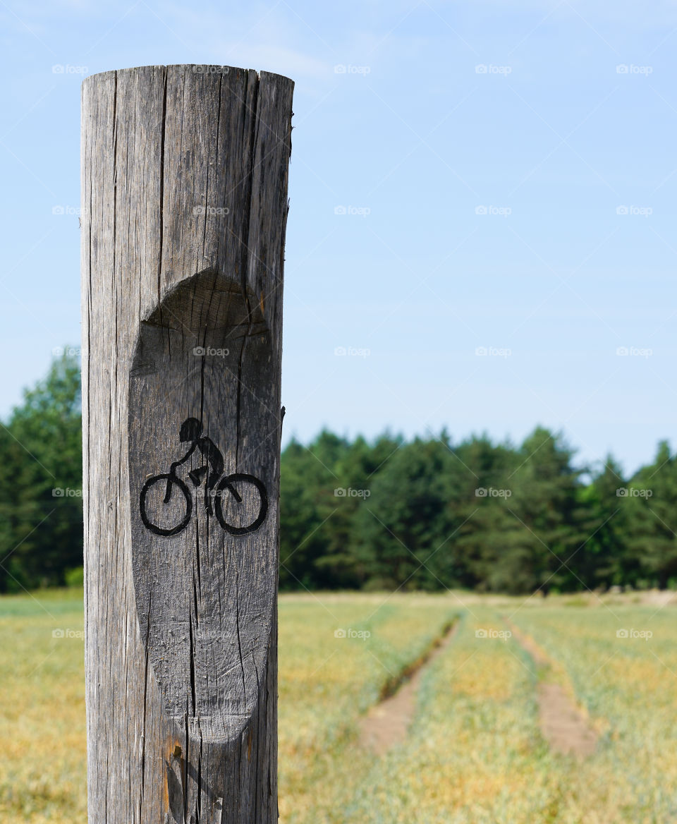 original bicycle path sign from wood material