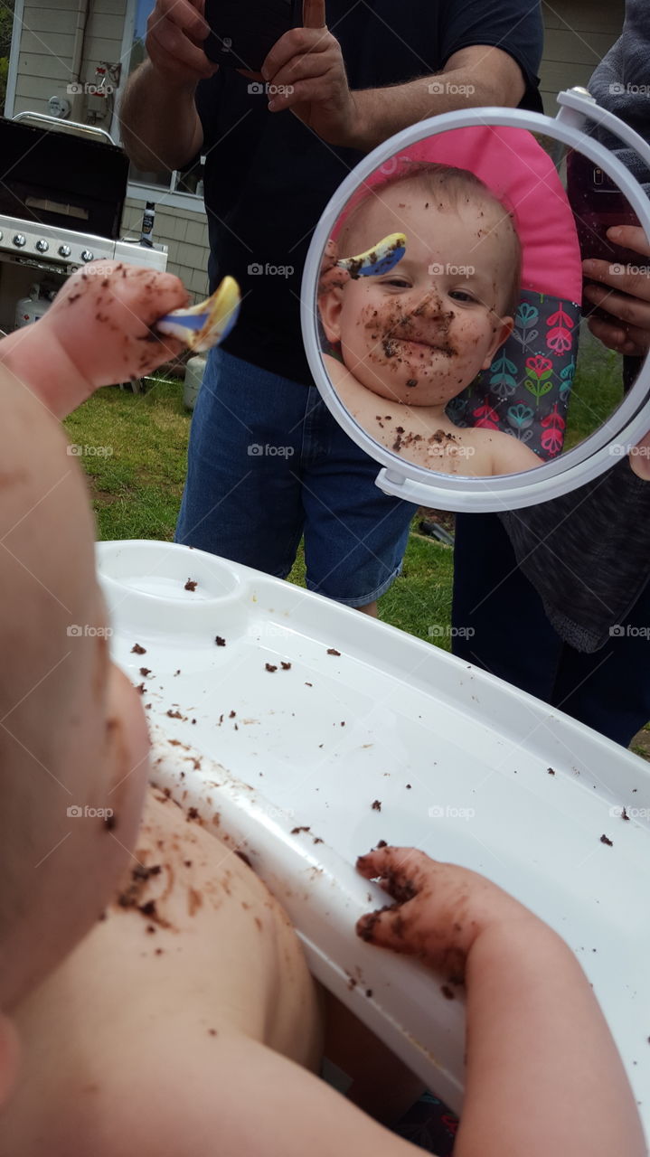 look how cute I am covered in cake!