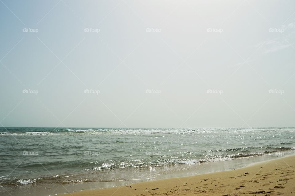 Sea, sun, sand.
It can be warm and inviting, angry and threatening, bright and quiet, harsh and cold