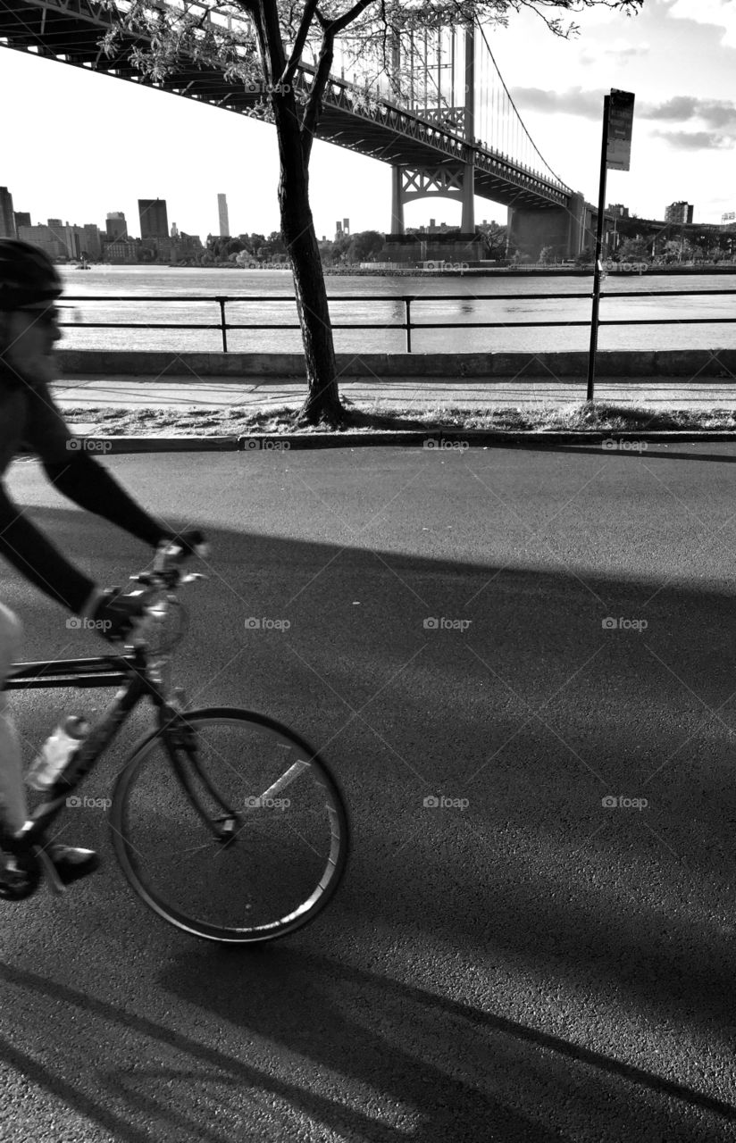 Cyclist pedal at Astoria Park in Queens 