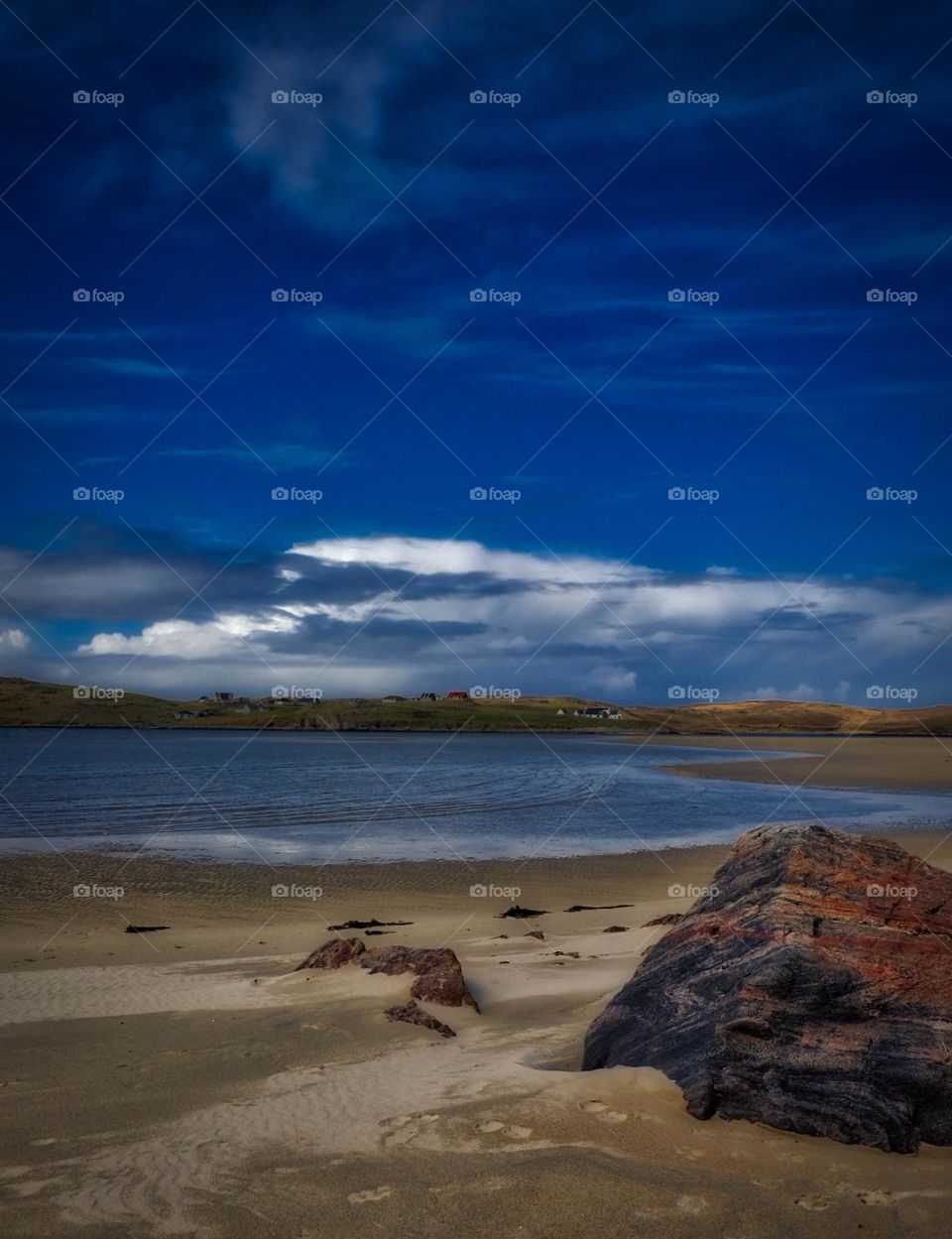 Red rock on the beaches of Scotland, waves on the beaches of Scotland, making memories in Scotland, vacation in Scotland 