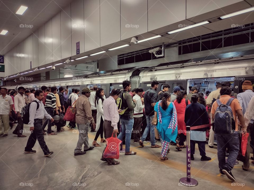 people getting into metro