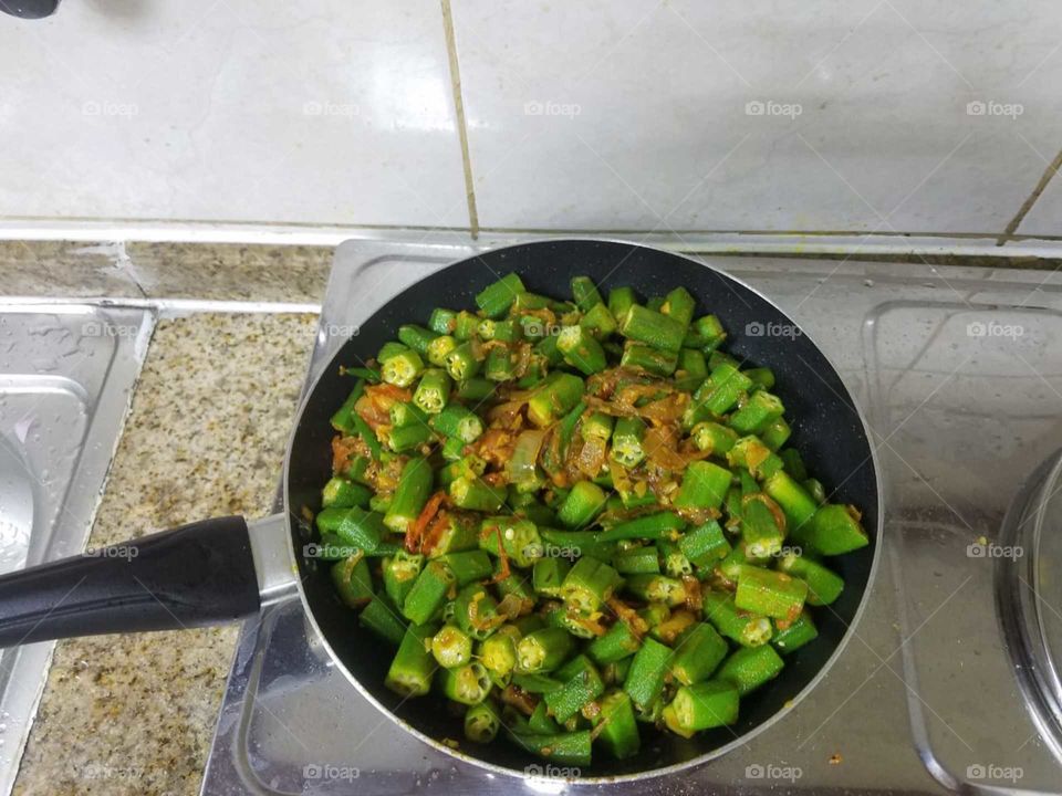 Bhindi...Food lovers get set go. Tasty Indian food in making