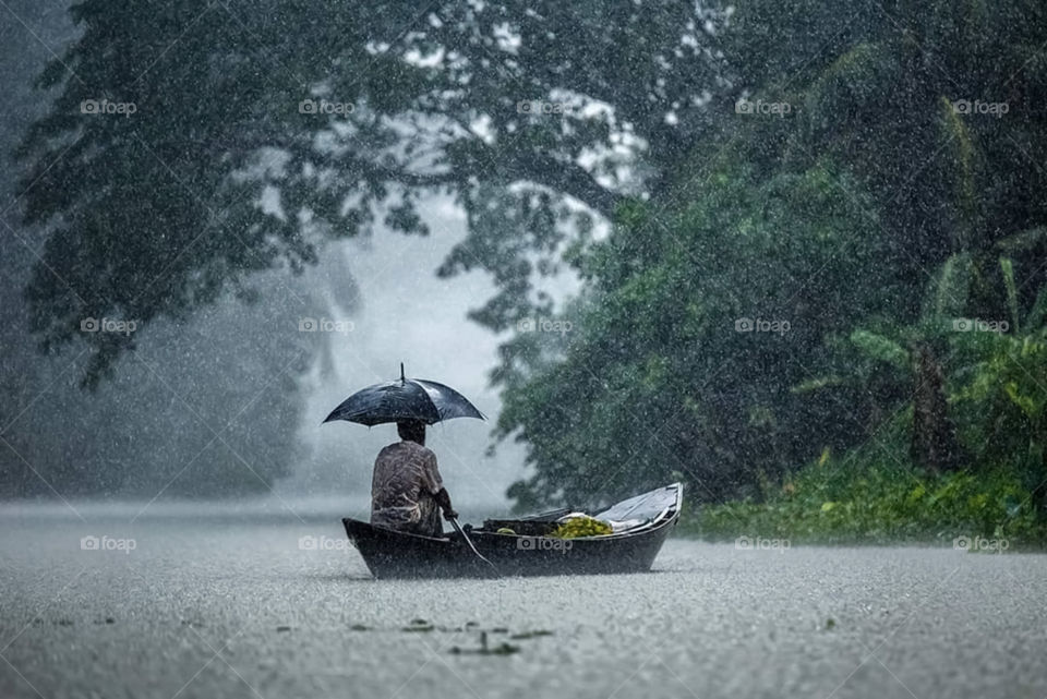 The Boatman Stock Photo
The Boatman In Rainy Day