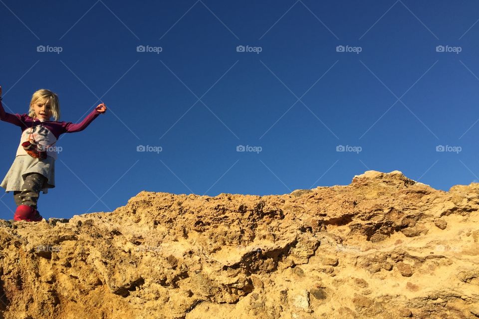 Girl on a cliff