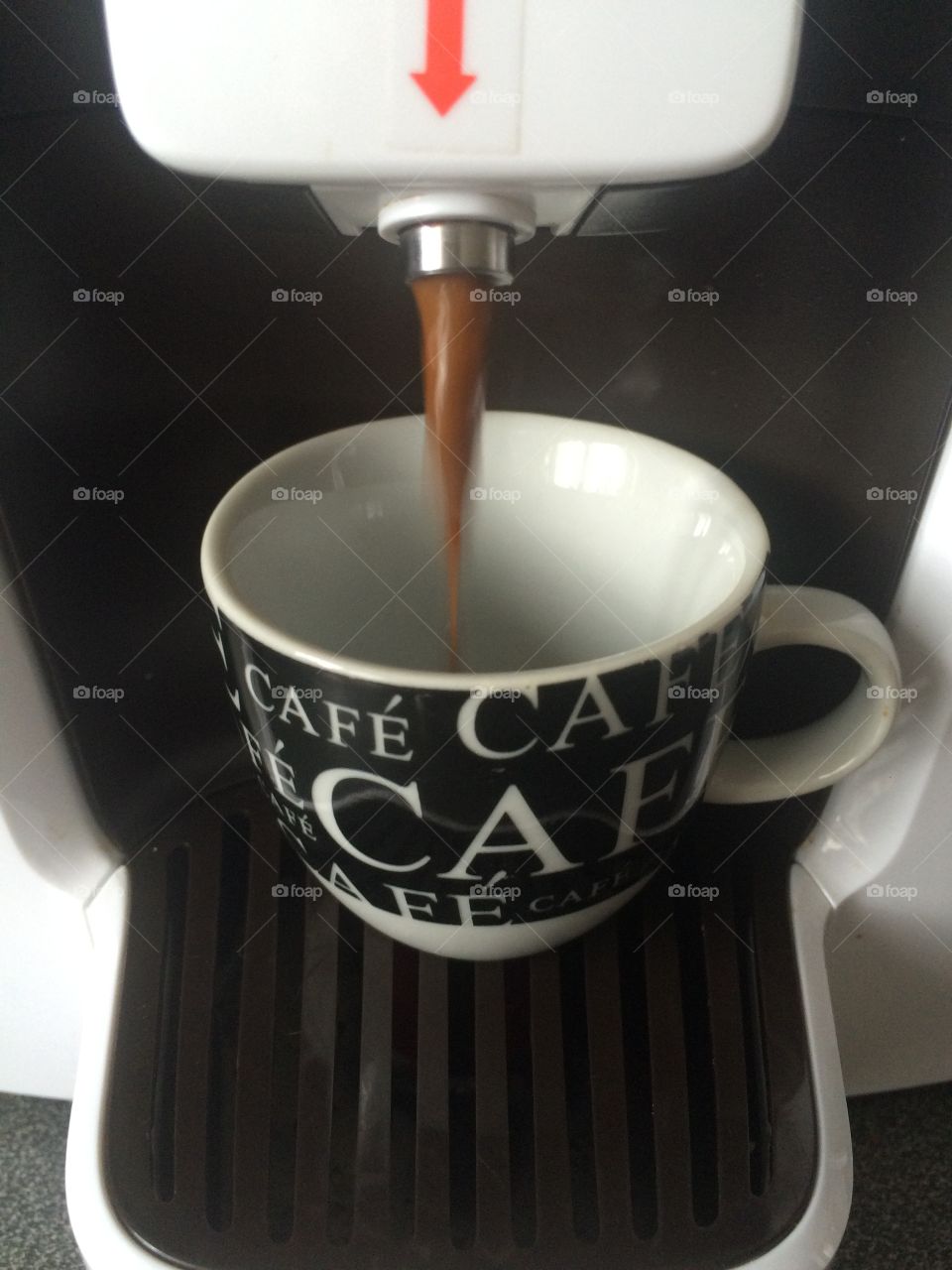 Pouring espresso coffee
