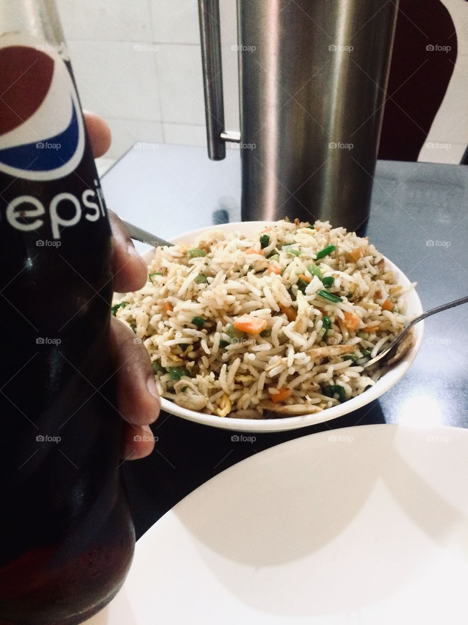 Food pepsi and chicken fried rice