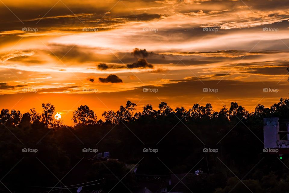 sunset light with dramatic cloudy sky