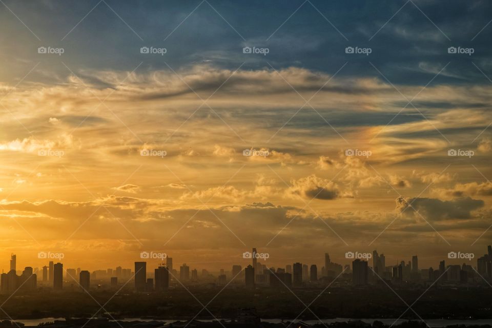 Twilight above skyscraper scape in Bangkok Thailand