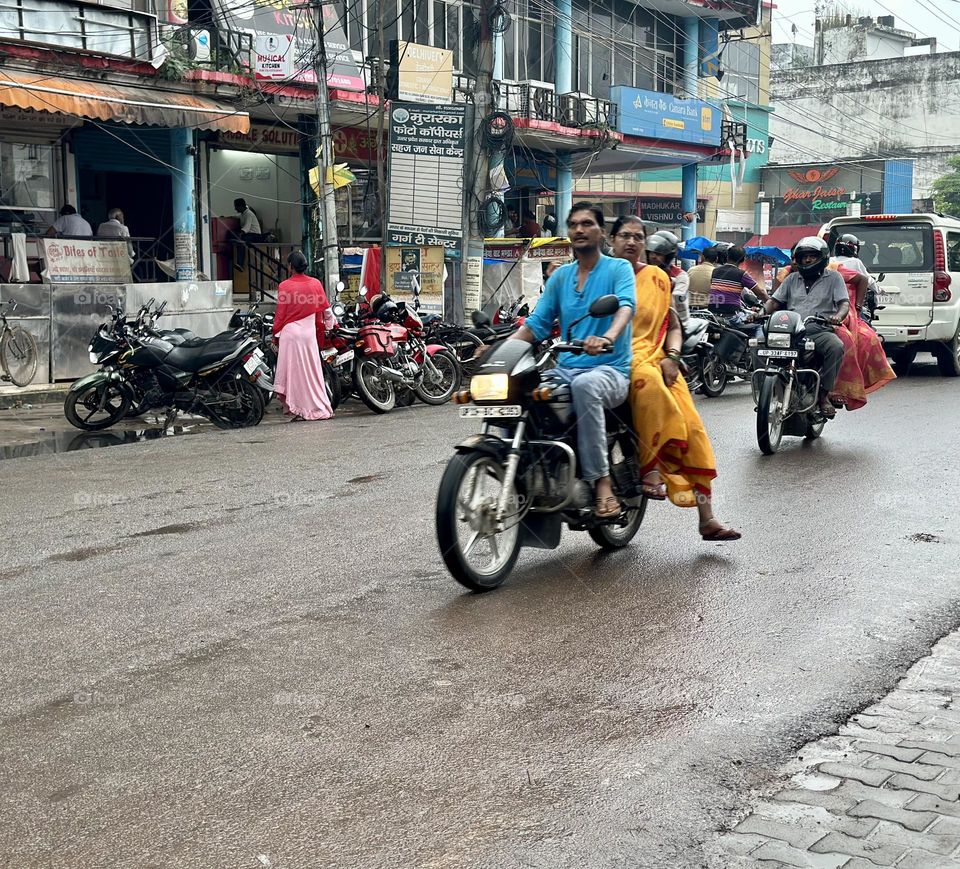 Man with his wife on motorcycle 