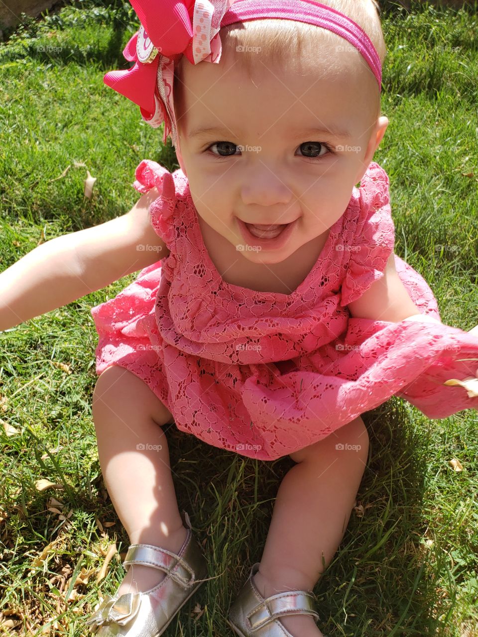 baby girl happy on the grass