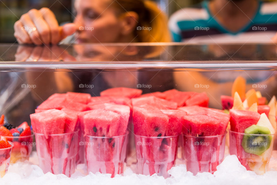 Saleswoman In A Fruits Shop
