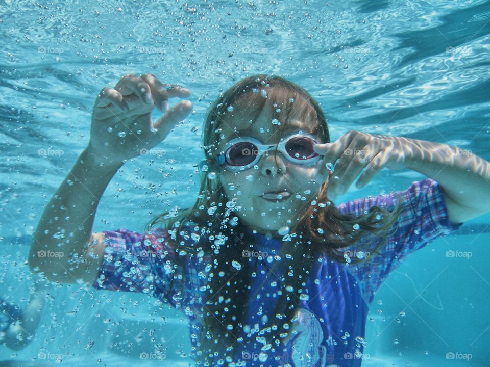 Girl swimming in underwater
