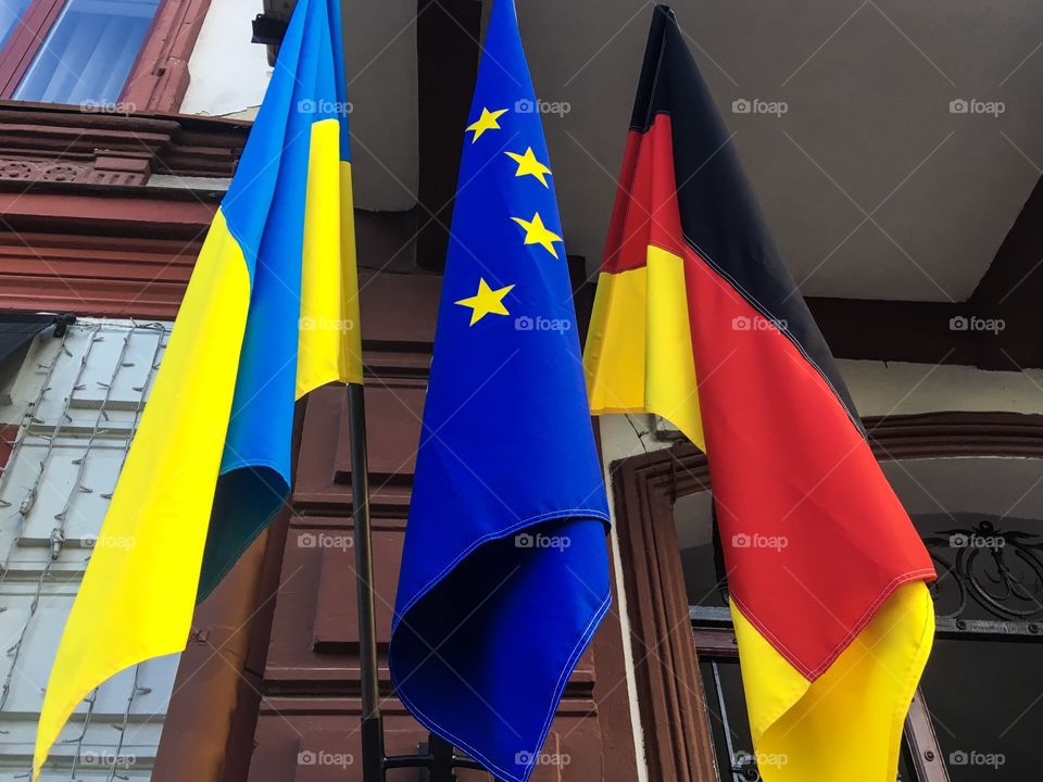 The national flags of Ukraine, Germany and EU. 
