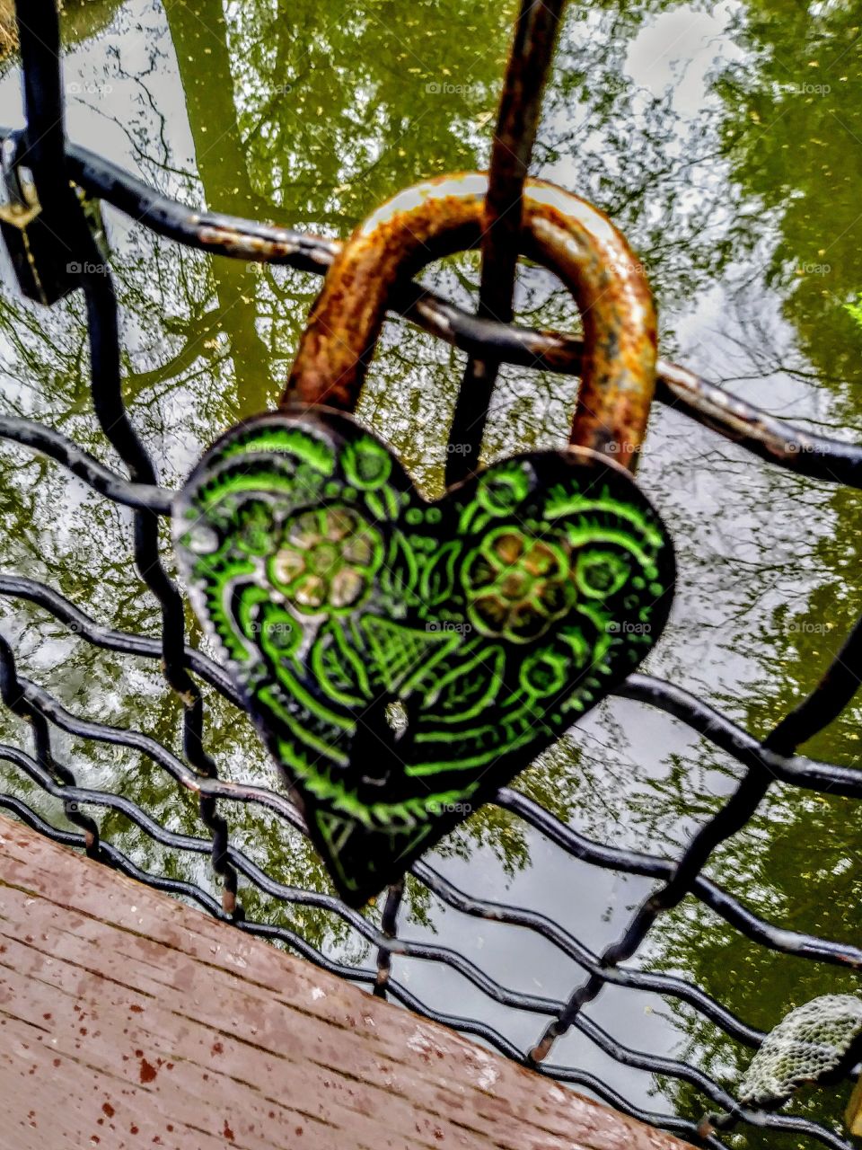 engraved heart love lock with a day of the dead design. very detailed and beautiful