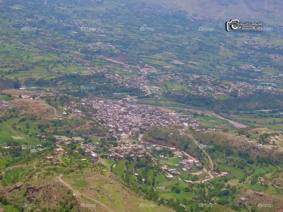 Glory be to God, the magnificent and picturesque view and the natural green trees are a view that is nothing more wonderful than it