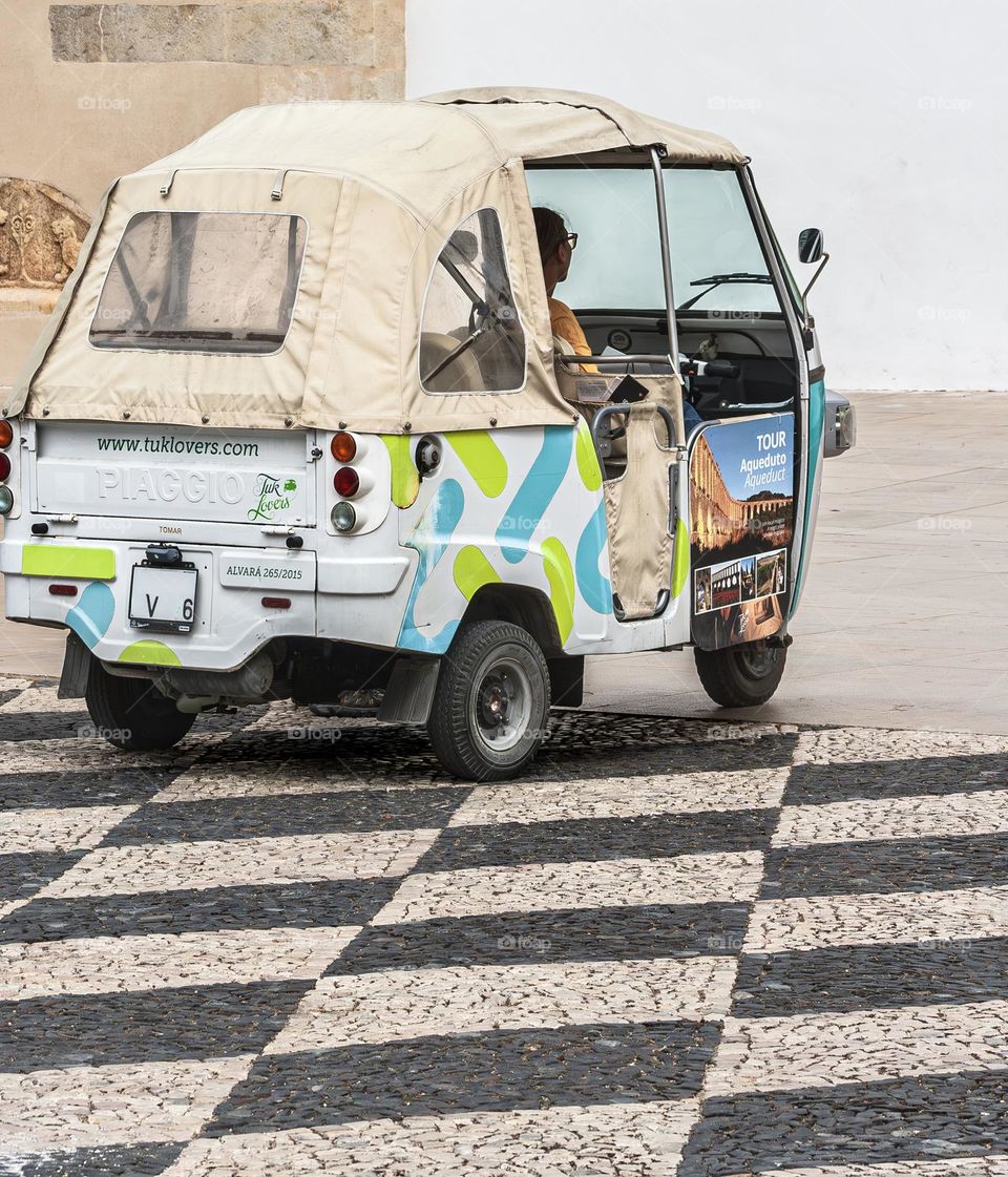 A tuk-tuk waiting for their passengers in Tomar, Portugal 