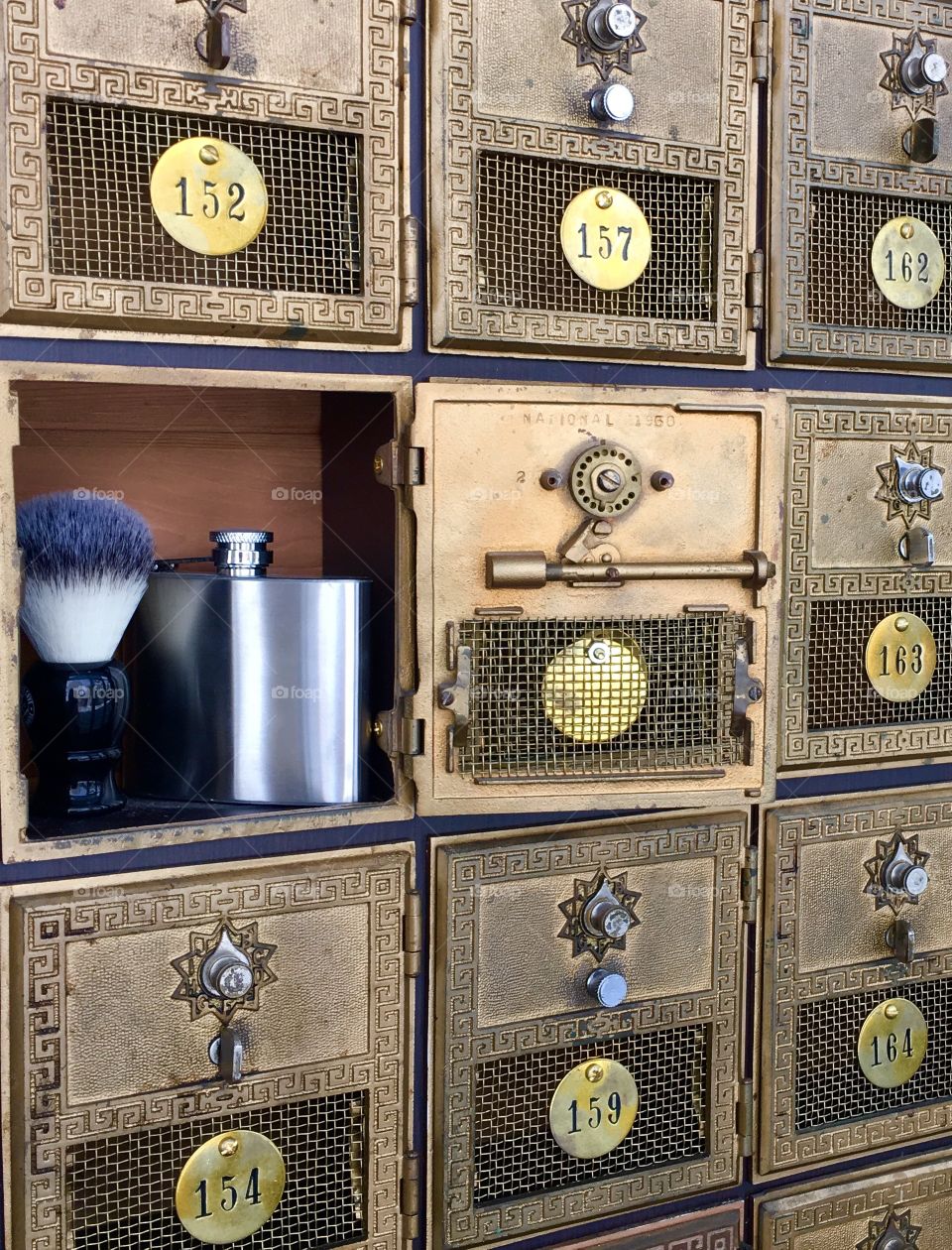 Old post office boxes, flask and shaving brush
