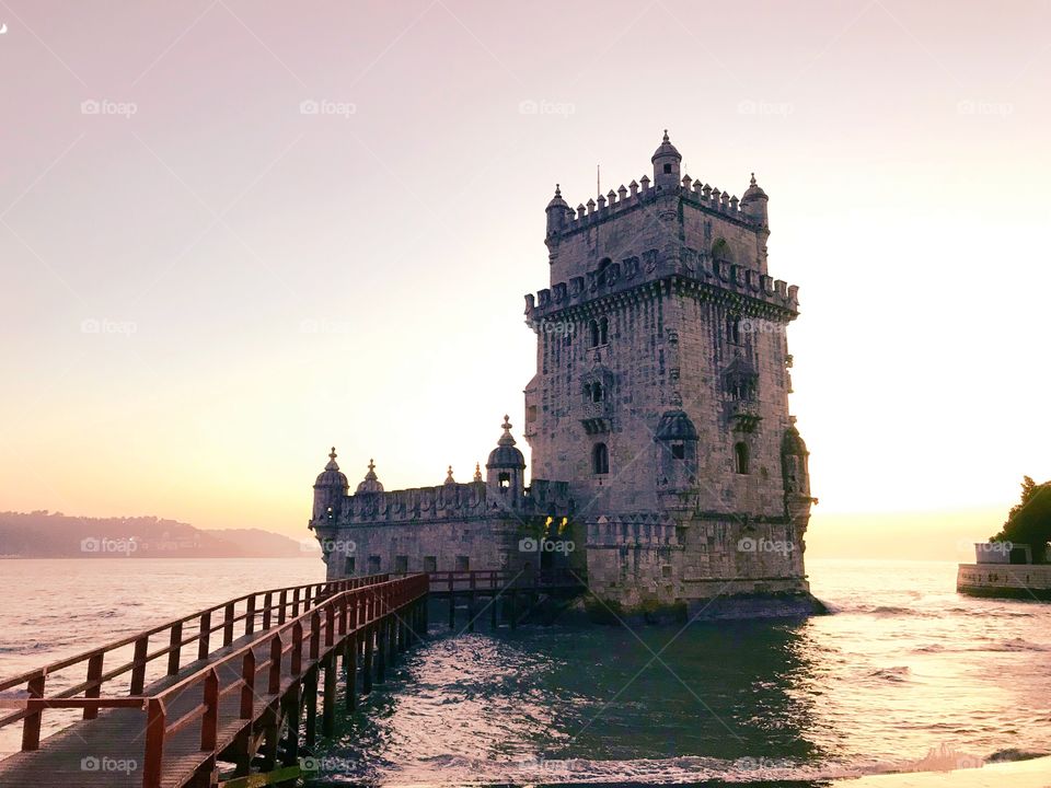 Beautiful sunset over the Belém Tower in Lisbon, Portugal. 