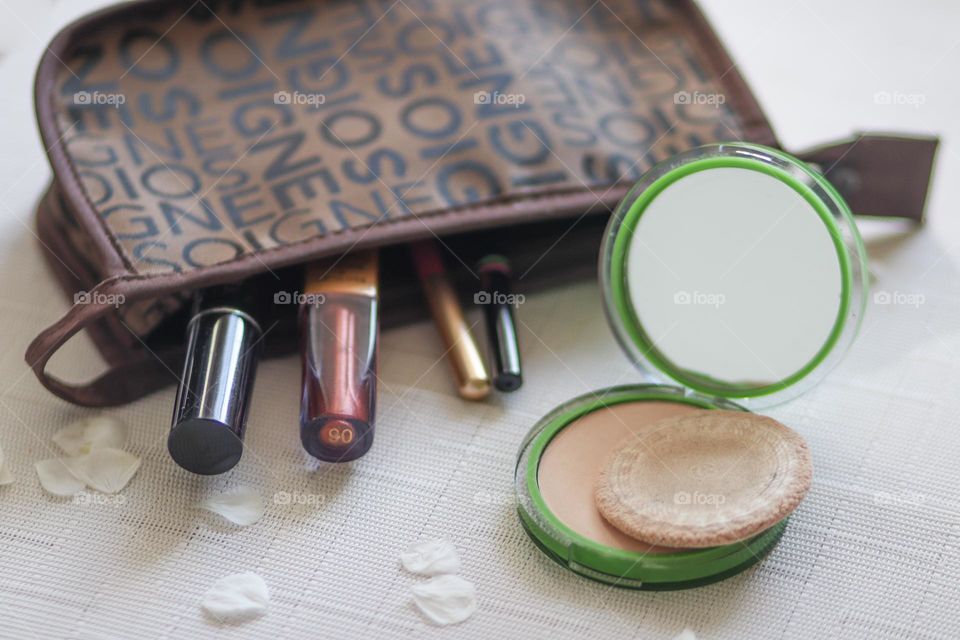 Cosmetics bag with makeup products