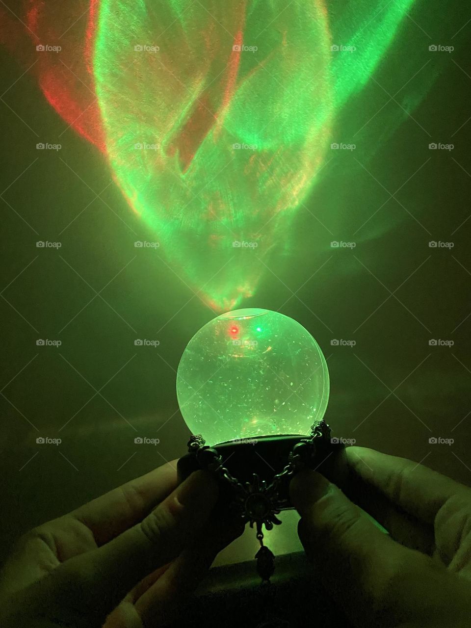 Halloween vibes by conjuring the unknown with a crystal ball.