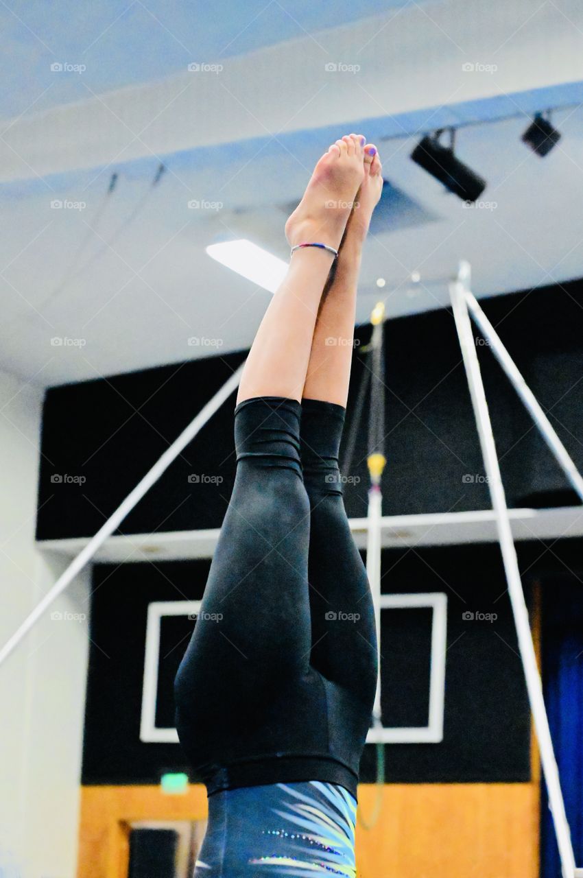 Head stand for the qualified, strong upper body can sustain to hold the lower body up high. 