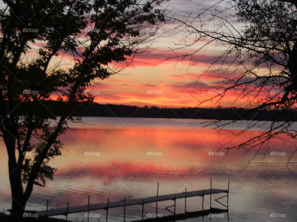 Pier over Whitmore lake during sunset