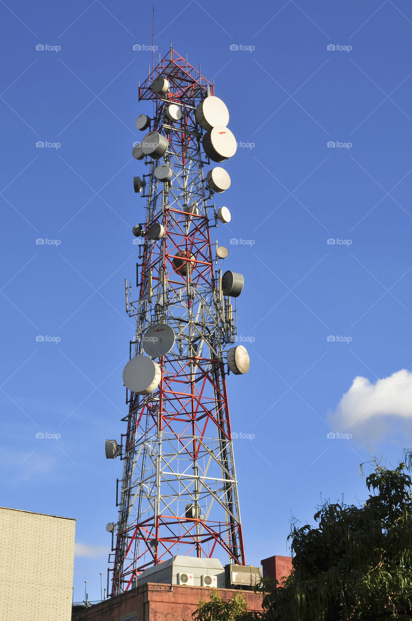 communications antennas With blue sky as background