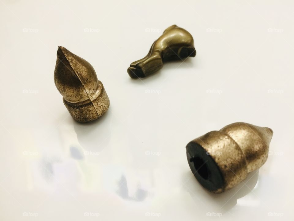 Gold. In a white background