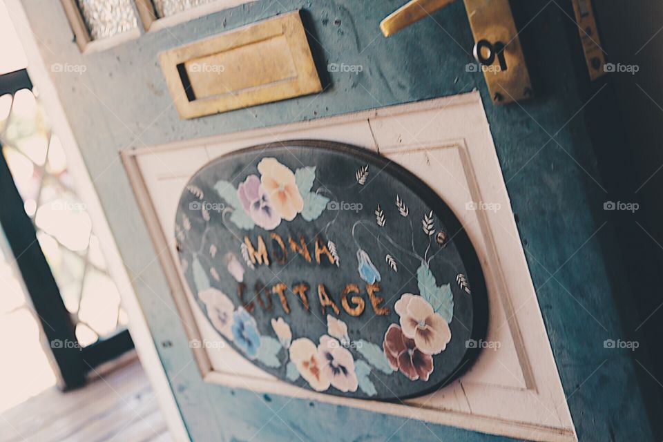 Wooden decorated door in blue