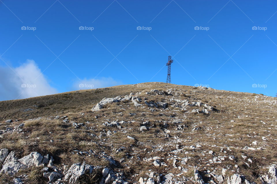 summit with Christian cross