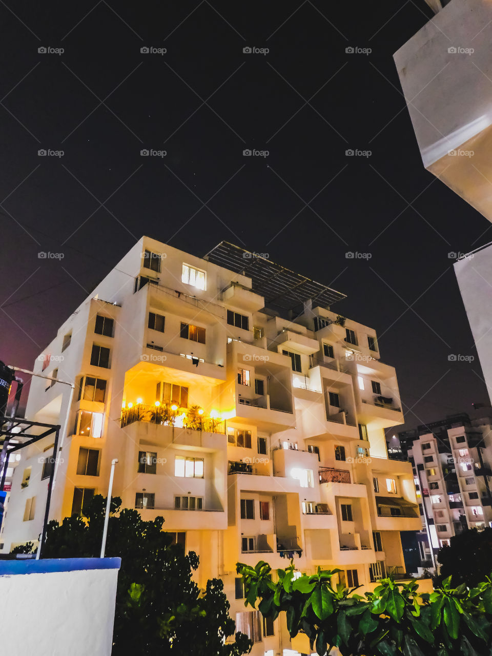 Night landscape_Beauty of City life at night time with black sky background having sparking stars.